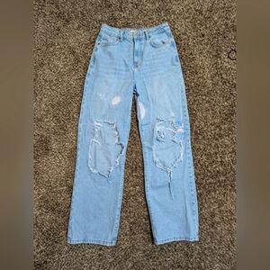 Woman's Straight Leg Ripped Jeans